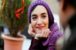 واکنش میترا حجار به راه رفتن مردم از روی عکسش در کف خیابان + عکس