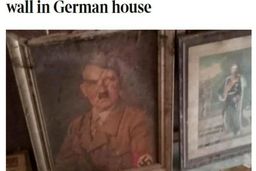 سیل، تابلوی پرتره هیتلر را از یک ساختمان بیرون کشید