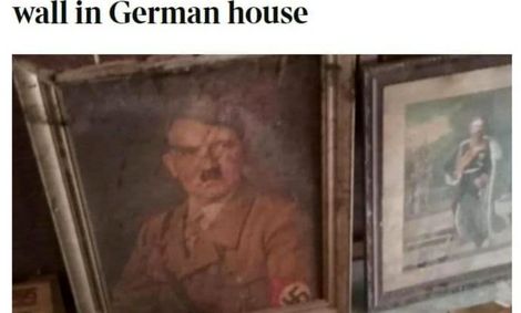 سیل، تابلوی پرتره هیتلر را از یک ساختمان بیرون کشید