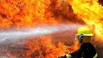 آتش سوزی در یکی از مجتمع های نزدیک به راه آهن تهران